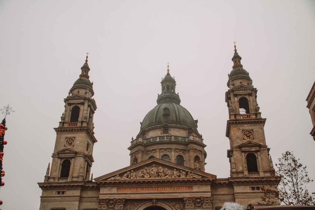 a large building with two towers and a clock