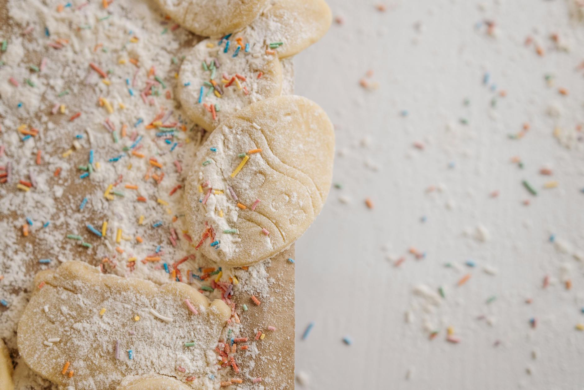 Close-up of homemade sugar cookies dusted with sprinkles.